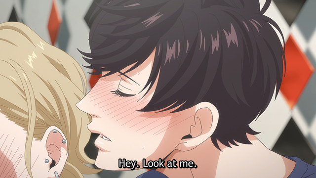 A teenage boy (Tao) leaning in to the ear of another boy (Hisahi) while saying, "Hey. Look at me." His eyes are closed and his cheeks are blushing.