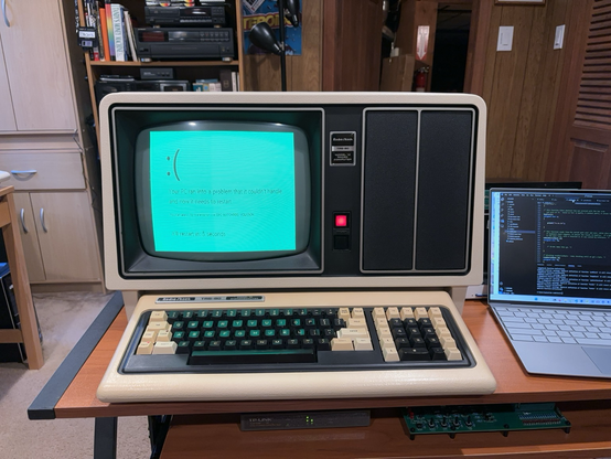 TRS-80 Model 12 displaying a Microsoft Windows blue screen error.