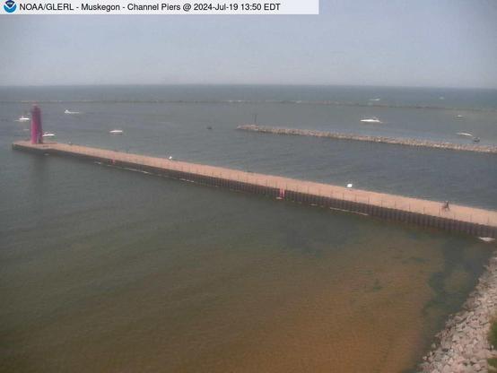 View of Muskegon Channel piers jutting out into Lake Michigan. // Image captured at: 2024-07-19 17:50:01 UTC (about 13 min. prior to this post) // Current Temp in Muskegon: 73.74 F | 23.19 C // Precip: scattered clouds // Wind: WSW at 8.053 mph | 12.9 kph // Humidity: 67%