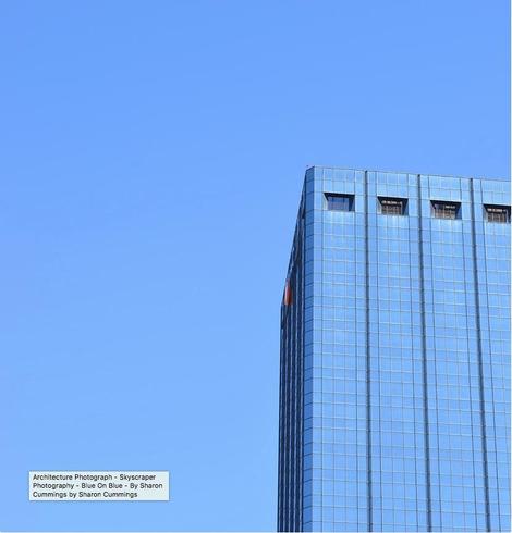 Photograph of a building against a blue sky in Tampa Florida by Sharon Cummings.