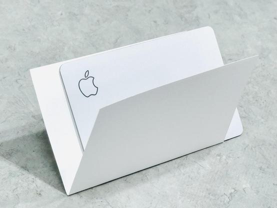 The same Apple Card from the previous toot, wrapped in a folded piece of middle weight paper, cut to match the card’s size and protect it from stains that my leather wallet left on my previous/expired card.