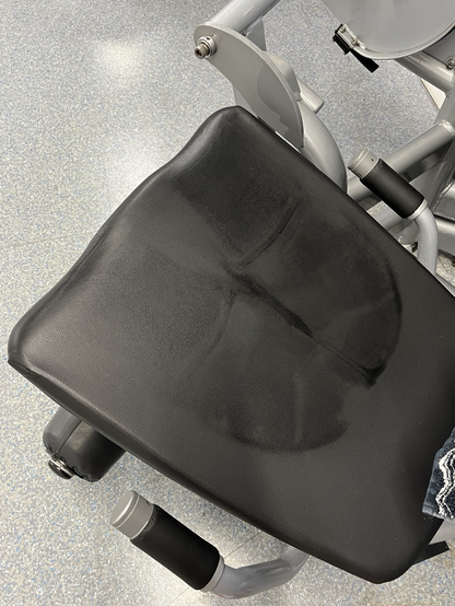 The leg extension machine at the gym with my delicious looking ass print and sweat stain left on the seat… 