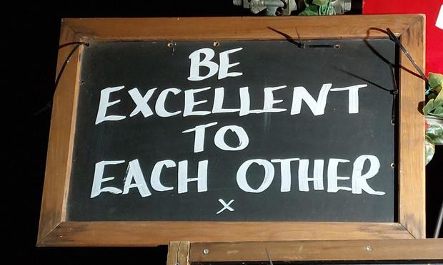 Sign reading "Be excellent to each other".