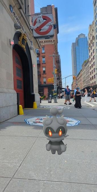 A Pokémon GO AR photograph of  Marshadow at the Ghostbusters' Hook and Ladder Firehouse.