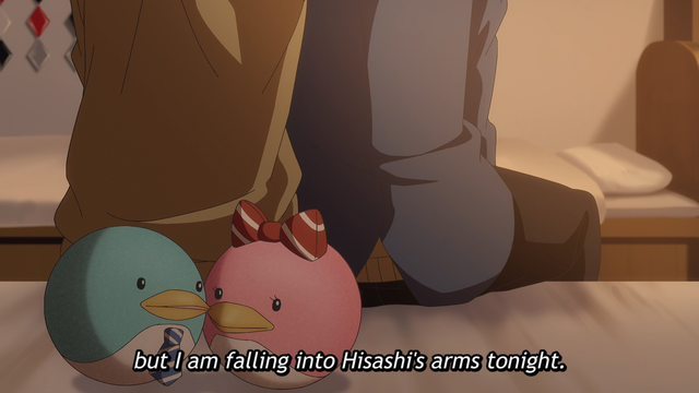 Two teenage boys (Hisashi and Mao) seen from behind, wearing clothes, sitting on the edge of a bed, with a subtitle of Mao thinking, "...but I am falling into Hisashi's arms tonight." On the bed are two plushies close to one another.