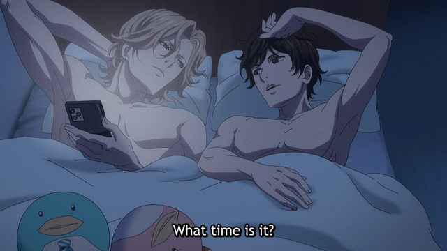 Two teenage boys (Hisashi and Mao) in a bed, one holding a phone, while the other asks "What time is it?"