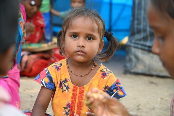 Child having a meal in India