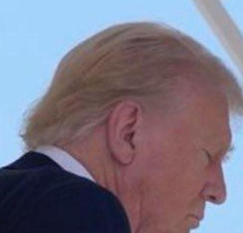 A photo of Trump’s fully intact right ear.