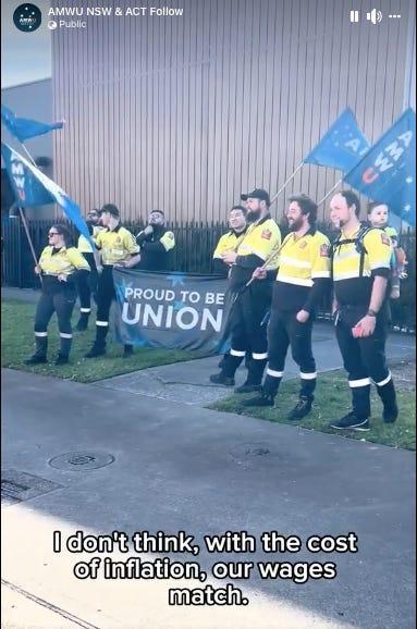 AMWU members hold union flags and banner 
PROD TO BE UNION 