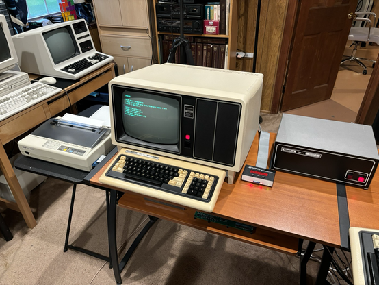 TRS-80 Model 12 computer with dot matrix printer and TRS-80 Network 3 controller.
