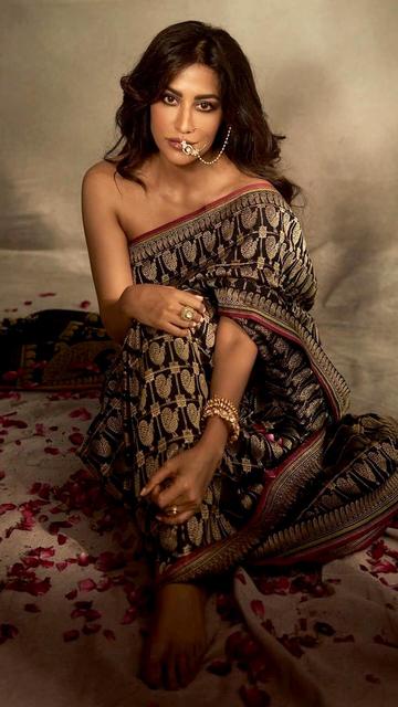 In a stunning new photoshoot, Chitrangda Singh opts for a luxurious saree without a blouse, showcasing her confidence and sophistication. The rich fabric and detailed craftsmanship of the saree reflect ultimate luxury. Chitrangda's daring fashion choice is a testament to her style and elegance. This photoshoot is a must-see for fashion enthusiasts and fans of the actress alike. Dive into the world of high fashion with Chitrangda Singh's breathtaking look.