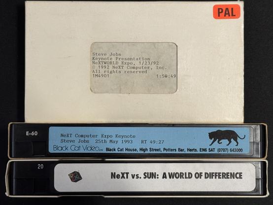 Photograph of three video tapes:

Steve Jobs
Keynote Presentation
NeXTWORLD Expo, 1/23/92
© 1992 NeXT Computer, Inc.

NeXT Computer Expo Keynote
Steve Jobs
25th May 1993
Black Cat Video, Black Cat House, High Street, Potters Bar, Herts. ENG 

NeXT vs. SUN: A WORLD OF DIFFERENCE