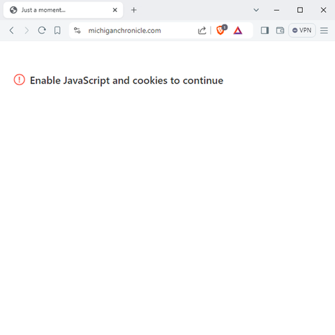 Screenshot of a mostly-blank browser window with text that reads "Enable JavaScript and cookies to continue."