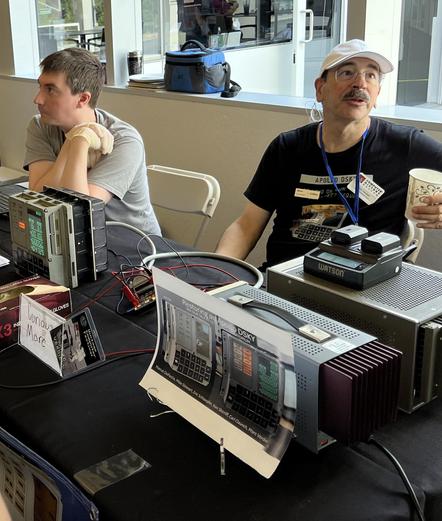 curiousmarc (Marc Verdiell) and Mike Stewart displaying  Apollo artifacts at a table at VCFWest