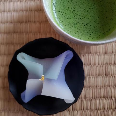 Nona's blue colour 'manten', a sweet that was inspired by the Star Festival. Rice dough is folded like origami to create a star shape, with a splash of edible gold leaf sparkling at the centre.
