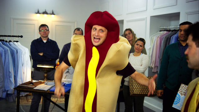 "We're All Trying To Find The Guy Who Did This" is a quote from the Netflix sketch comedy series I Think You Should Leave with Tim Robinson. The quote originates from a sketch where an unnamed man in a hot dog costume tries to pretend he is not the one who has crashed a hot dog-shaped car. The image of the man in the costume was widely used as a reaction image on Twitter and other websites in 2020 and early 2021, typically in response to complaints about problems from the people responsible for those problems.