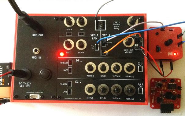 Photo of my Synth Thing (as per previous posts) hooked up via jumper wires to a MiniMo mini-synth.  The MiniMo is powered from the Synth Thing and takes its pitch input from the Synth Thing VCO and sends its audio output back to the Synth Thing's VCA.