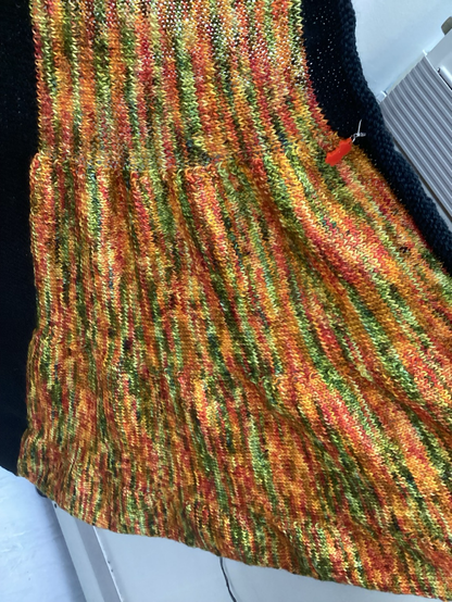 The Colonel Mustard section in its colours of green, red, yellow and orange showing how the fabric becomes wider towards the bottom.