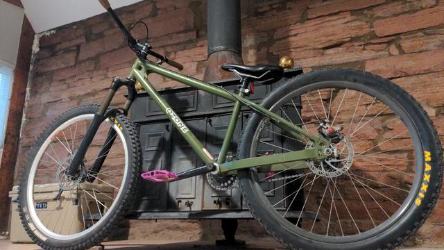 Green Dirt Jumper with Purple Pedals