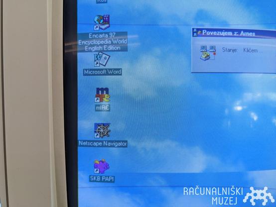 old windows desktop screen, with visible mIRC icon and dial-up dialog displayed