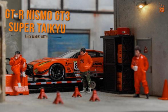 Three guys and Nissan GT-R Nismo GT3, Super Taikyu Series 2021, Fuji 24 hours 2021, No. 81 Winner by Tarmac Works in 1:64 scale with 1:64 figure on AREA 164