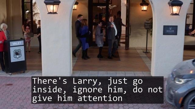 A screenshot from the TV show Curb Your Enthusiasm episode S09E06 'The Accidental Text On Purpose'.

Over laid is the text of a haiku:

There's Larry, just go
inside, ignore him, do not
give him attention