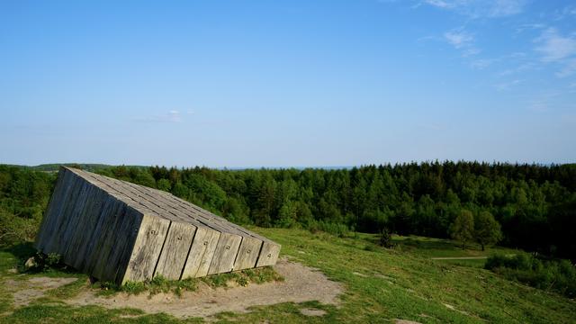 Cube shaped wood artwork in the hills of Svanninge on the island of Funen, Denmark, Europe.