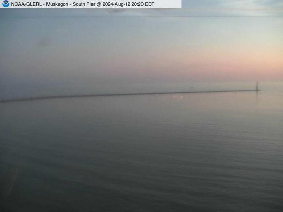 Wide view of the Muskegon channel southern breakwater stretching into Lake Michigan. // Image captured at: 2024-08-13 00:20:01 UTC (about 13 min. prior to this post) // Current Temp in Muskegon: 70.19 F | 21.22 C // Precip: scattered clouds // Wind: SW at 5.749 mph | 9.25 kph // Humidity: 84%