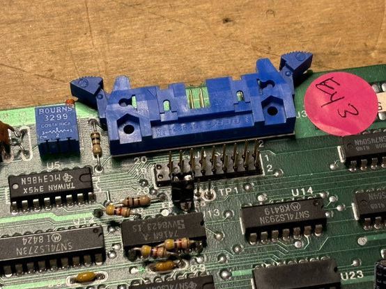 Circuit board with a 20-pin connector.  The connector has two broken pins.