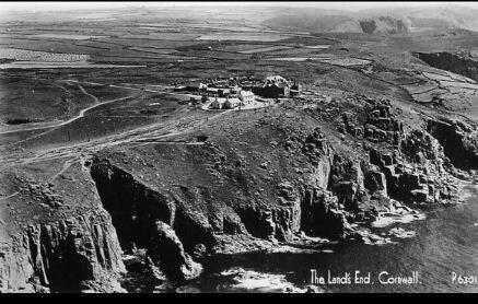 post card small village high on a cliff looking out over the sea