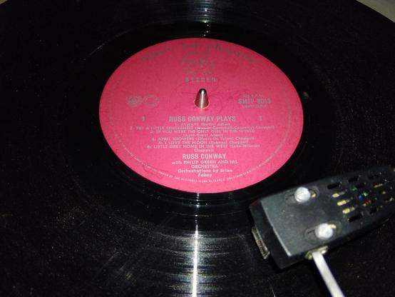 Closeup of LP showing Side 1 label and stylus end of tone arm.
Always
Loving you always,
Not for just an hour,
but always,
I'll be loving you always
I'll be loving you, always,
With a love that's true.
Not for just an hour, not for just a day, not for just a year,
But always