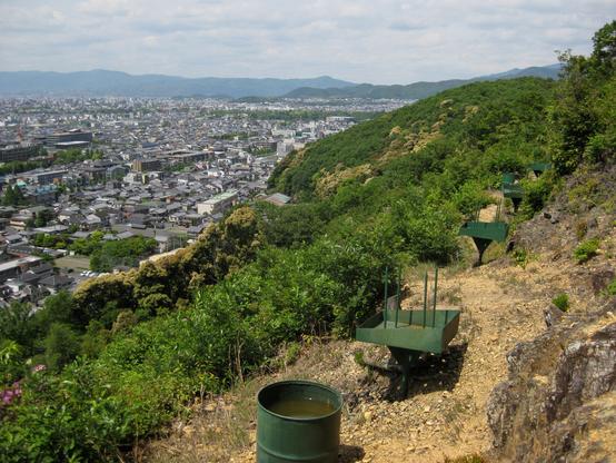 The metal fire pits on Matsugasaki's Higashiyama (these form part of the 'Ho' character).