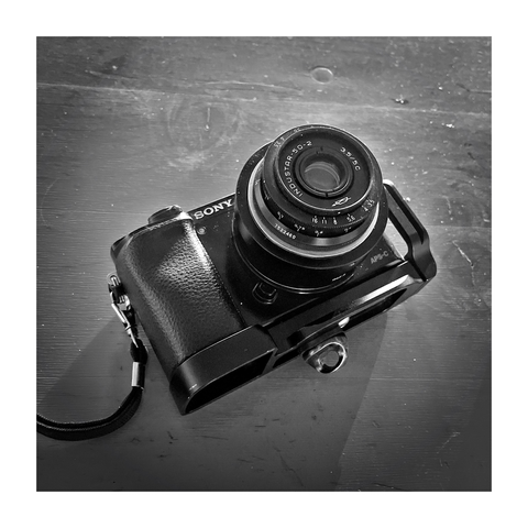 a 21st century camera with a 20th century russian film lens mounted to it, making it very much less than Auto. Hashtag "there ain't no manual for this muthafucka"