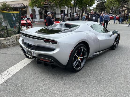 Ferrari 296 GTS side view on Ocean Avenue in Carmel