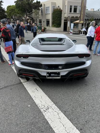 Ferrari 296 GTS rear rview on Ocean Avenue in Carmel