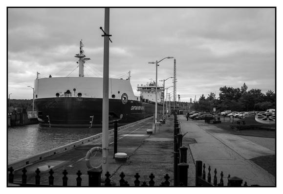 bulk load ship entering a canal lock