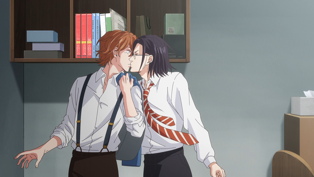 A teenage boy (Jin) appearing surprised as another teenage boy (Giichi) pulls him close and gives him a kiss.