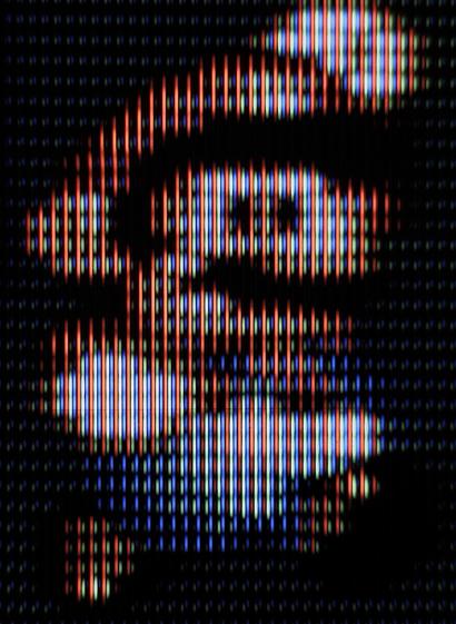 Mario mid-jump in Super Mario World (SNES) on Sony Trinitron CRT TV