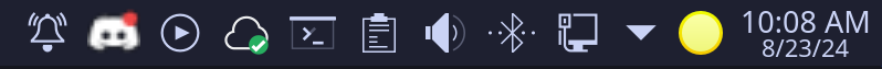 Screenshot of the system tray in KDE. All the icons are high resolution, and most are styled in the desktop theme. The icon for Discord is very blurry and pixelated.