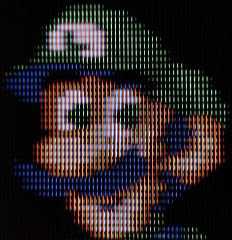 Luigi's face from the ending of Super Mario World (SNES) on Sony Trinitron CRT TV