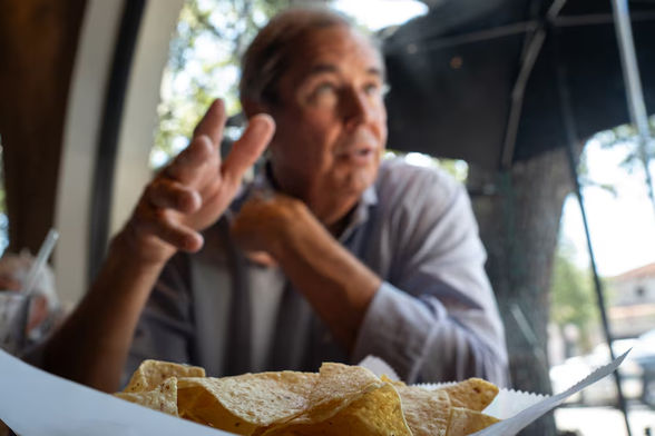 Ray Washburne, owner of Highland Park Village and Mi Cocina, eats at the Mi Cocina Restaurant in Highland Park Village on Aug. 14, 2024.(Azul Sordo / Special Contributor )