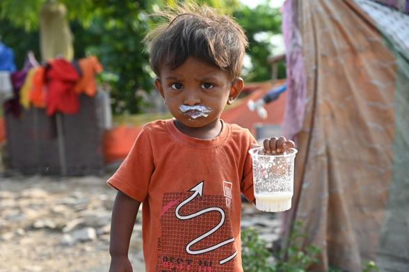 Little boy with yogurt