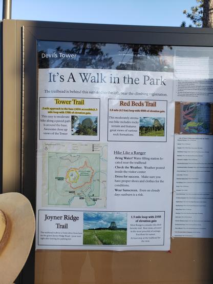 Ranger Sarah (bottom left) reads about the Trails