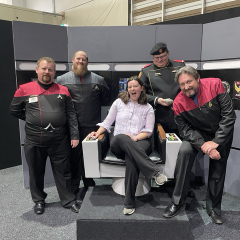 Ella in the original series Star Trek chair with cool people aka trekkies