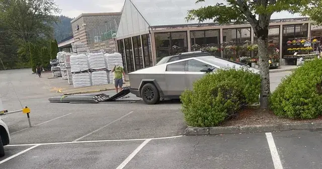 the same cybertruck like 50 yards later. they have slid out of the back of the truck because the guy tied the strap around them and not down to the bed. also, the guy has a really funny expression of exasperation while standing looking at them.
AltText from https://bsky.app/profile/aparker.io/post/3l2paot7zqo2n