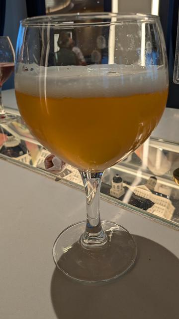 A goblet full of La Trappe Tripel