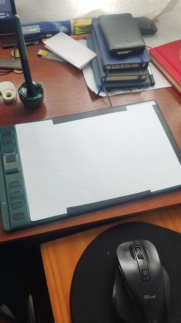 Drawing tablet with. Paper taped on top
