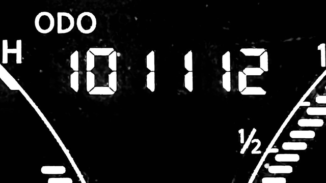 Vehicle odometer at 101,112 miles with spacing making it look like the sequence 10, 11, 12.