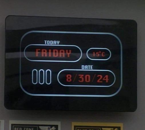 DS9 scene. We see a info panel on a wall. Just below is a smaller sign that reads "Red Zone." The panel itself reads today's date and it's shown as Friday, 8/30/24 and is showing 15 degrees celsius. No other caption, just wanted everyone to know what day it is today. 