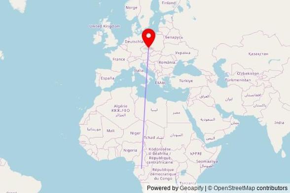 A map showing the great circle route from Makokou in Gabon to a map pin at Proměnění Páně, 14, 518 03 Roudné, Czechia